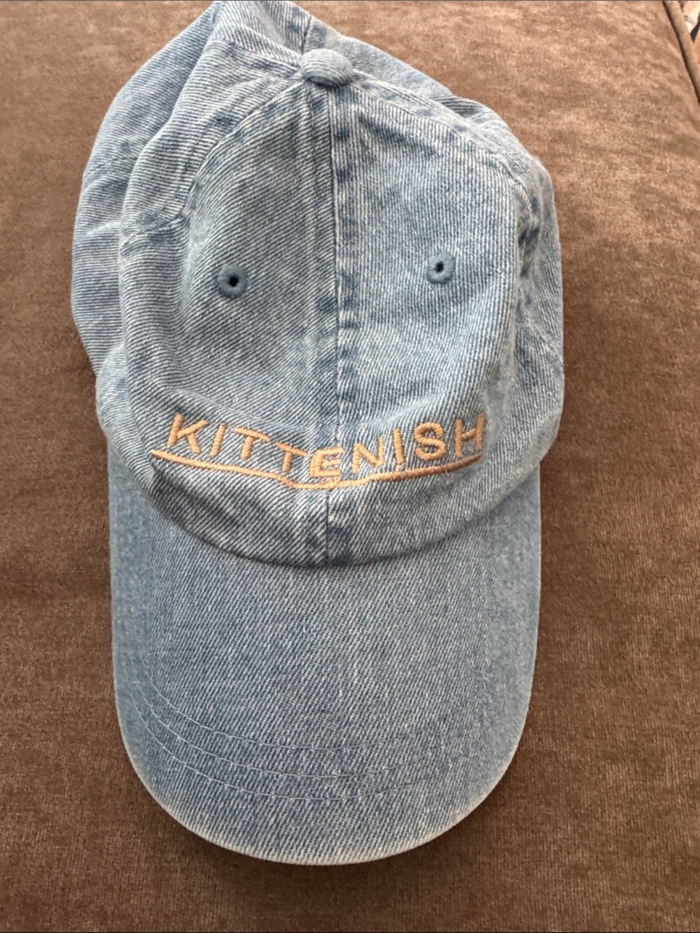 Kittenish Light Blue Denim Baseball Cap with Tan Embroidered Logo